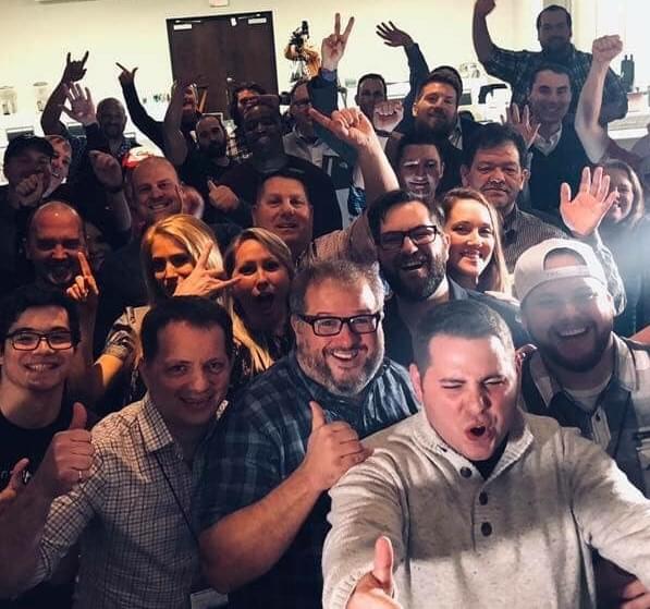 Implement community members at an in-person event